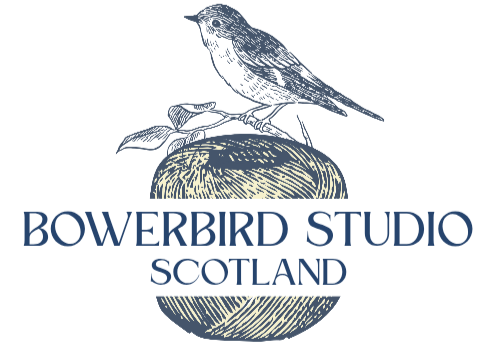 Logo of Bowerbird Studio Scotland featuring a bird on a branch with a spherical object below.